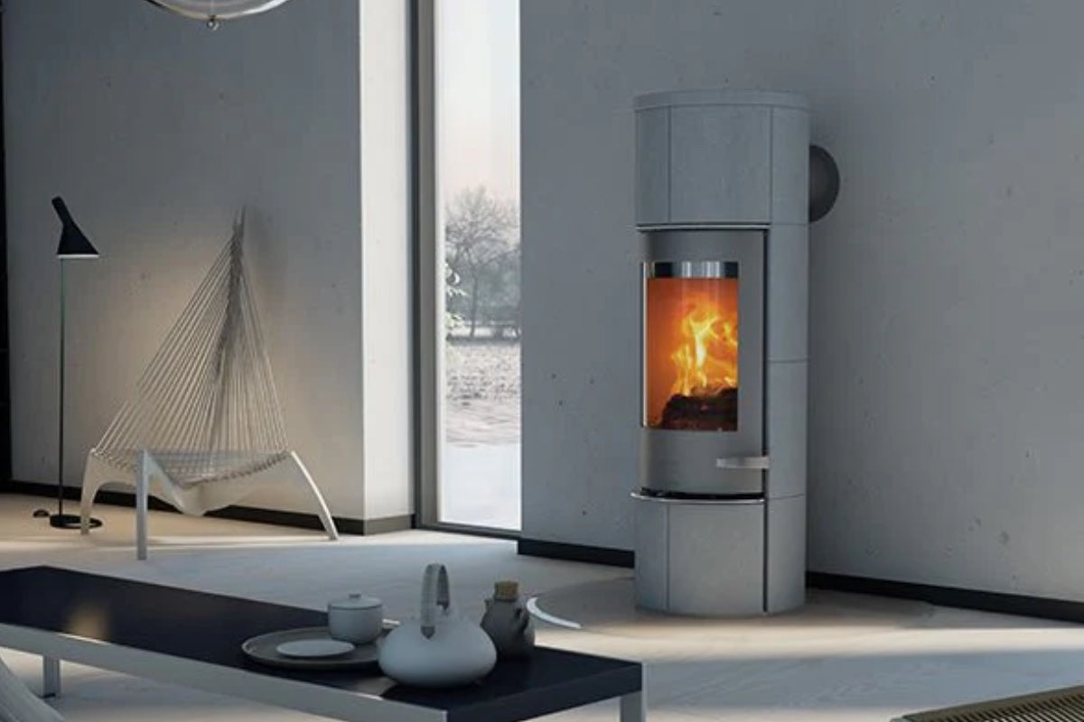 Lotus Prestige M Speckstein im Wohnzimmer – Kundenreferenz Schweiz, Ofenhaus Schleicher
